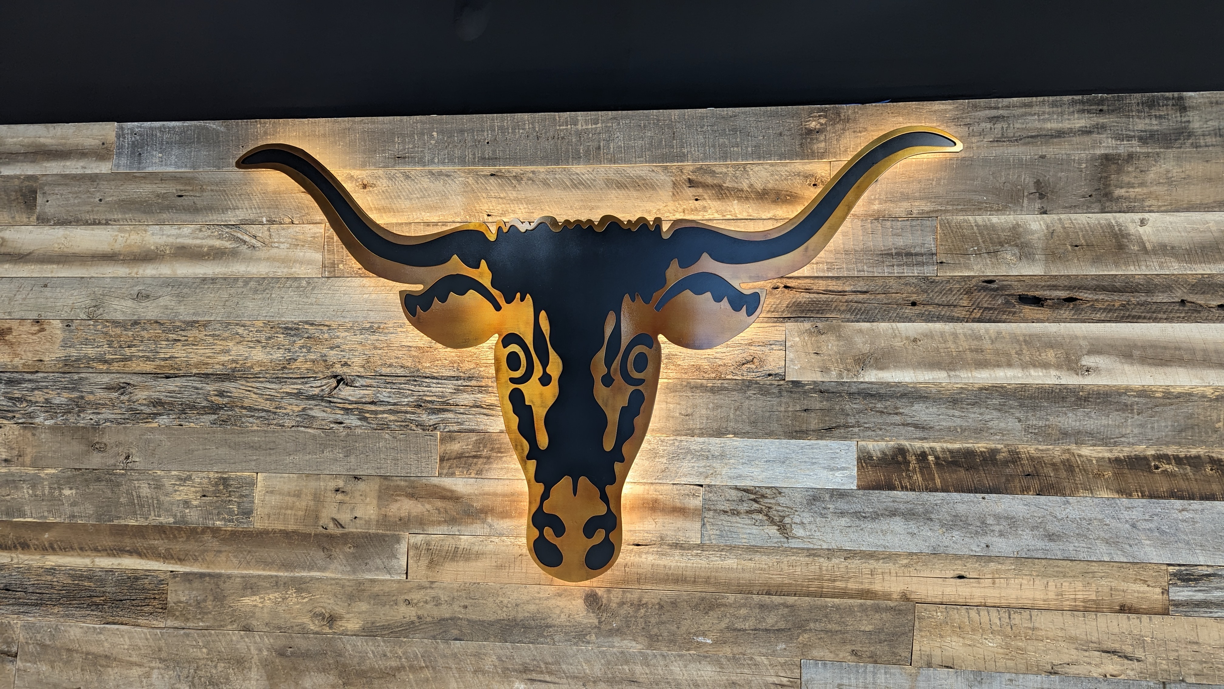 Backlit metal wall art